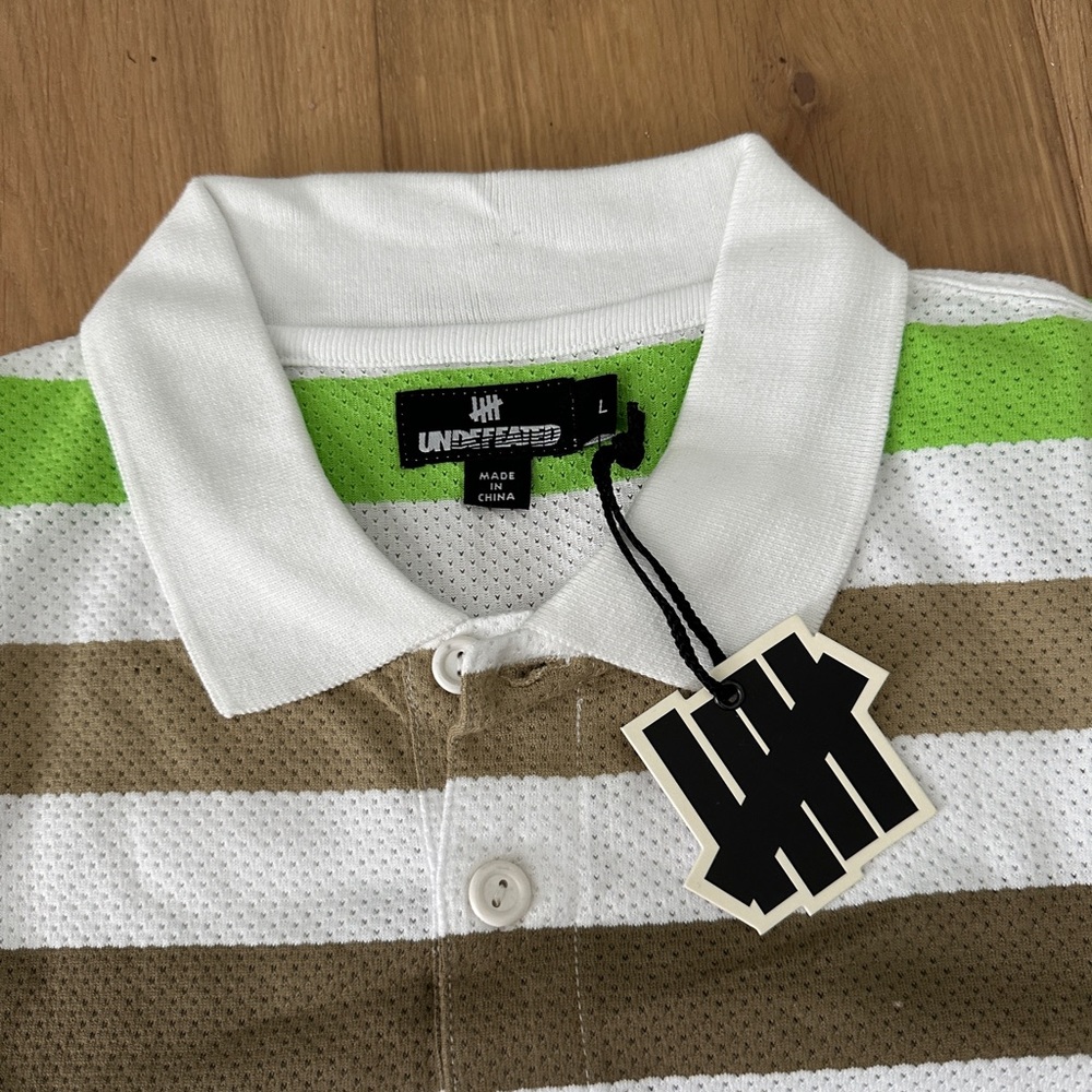 Undefeated Men’s Polo size Large NWT